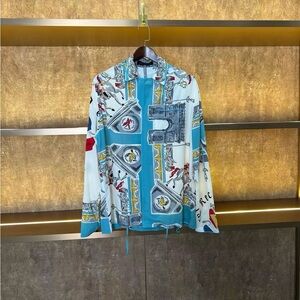 Authentic Louis Vuitton Light Blue, White and Red Printed Shorts